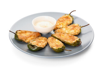 Plate with tasty jalapeno poppers and sauce on white background