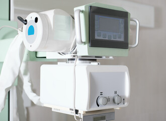 Naklejka premium x-ray machine in a clinic radiology department. modern diagnostics in a hospital