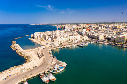 Italy, Province of Bari, Molfetta, Drone view of Mediterranean old town in summer