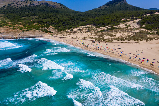 Spain, Mallorca, Cala Mesquida, Aerial view of Cala Agulla beach in summer
