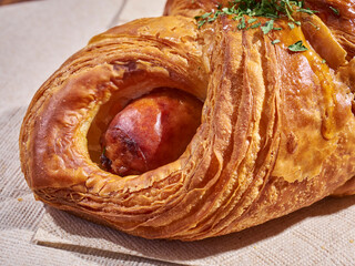 Hot dog baked in croissant dough, a Korean bakery favorite. This one is served in Bayside, Queens,...