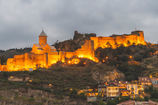 Georgia, Tbilisi, view on fortress Narikala at dusk