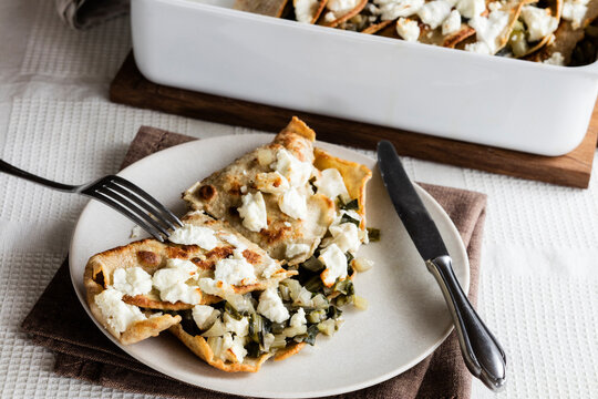 Plate of vegetarian galette with chard and feta cheese