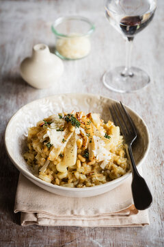 Bowl of ready-to-eat barley risotto with salsify