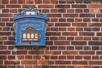 Historical mailbox at brick wall, Lauenburg, Schleswig-Holstein, Germany