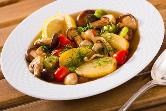 Mushroom hoosh boiled with honey fungus, lemon and vegetables