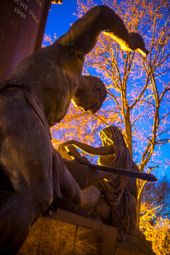Germany, Berlin, Bismarck Memorial statue of Sigurd forging sword with sibil in background