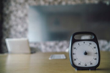Timer on a desk in a board room