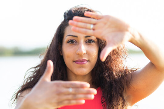 Portrait of young woman gesturing