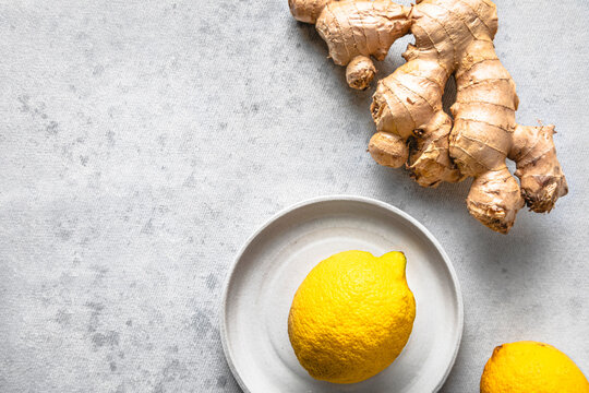 Studio shot of lemons and ginger root