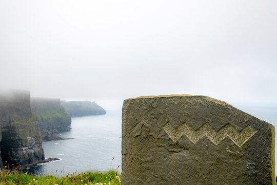Cliffs of Moher by sea during foggy weather at Clare, Ireland