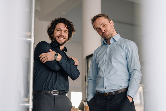Business partners in a coffee shop waiting for customers