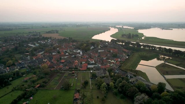 Orbital shot of Fortified town of Stevensweert at sunset, Netherlands
