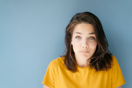 Portrait of a pretty woman, looking amazed