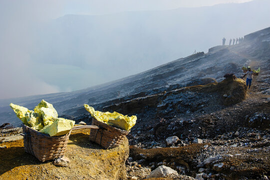 Indonesia, Java, East Java, Pieces of sulphur on the rim of the Ijen crater lake