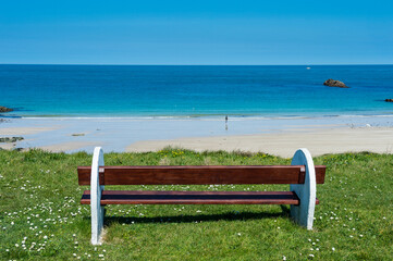 United Kingdom, Channel Islands, Alderney, Empty bench above Corblets bay