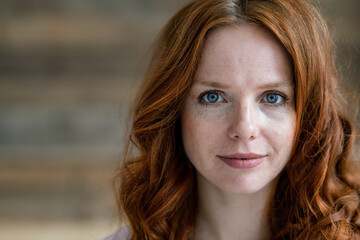 Portrait of redheaded woman with freckles