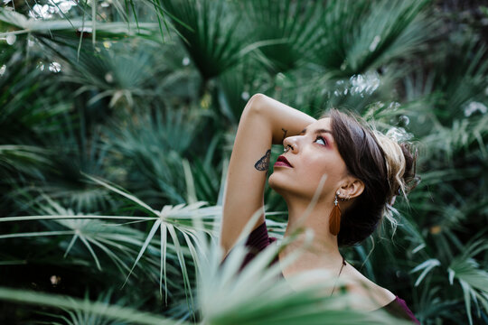 Portrait of young woman in park