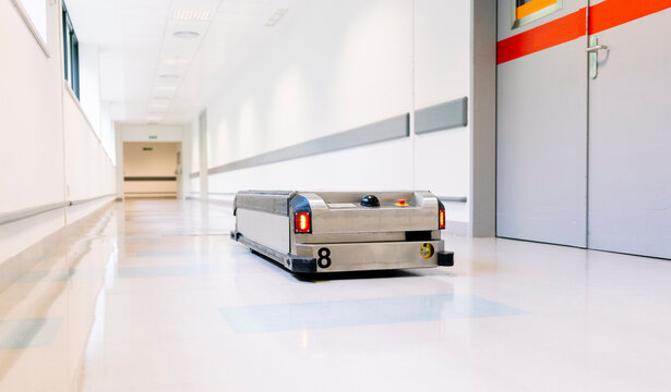 Close-up of robotic trolley on tiled floor in hospital
