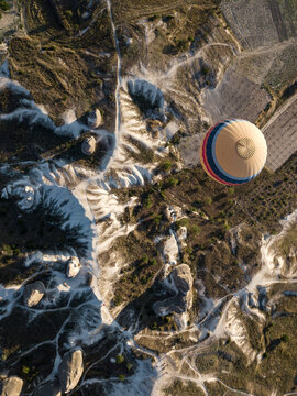 Drone shot of hot air balloon flying at Goreme National Park, Cappadocia, Turkey