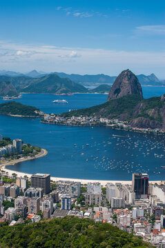 Outlook from the Christ the Redeemer statue over Rio de Janeiro with Sugarloaf Mountain, Brazil