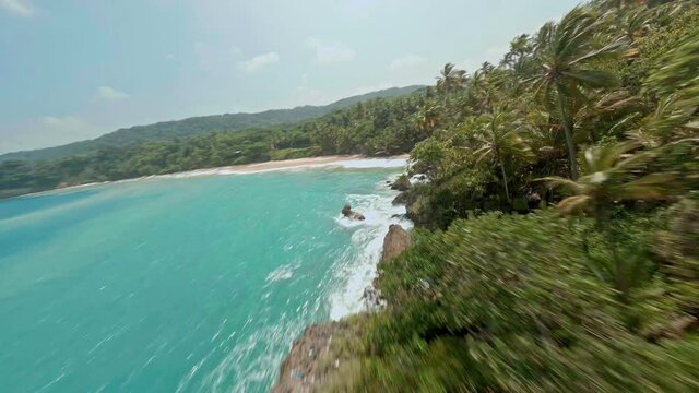 FPV, Ocean Waves On Shoreline Of Playa Navio And Playa Preciosa In Dominican Republic. - aerial