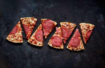 Slices of salami pizza