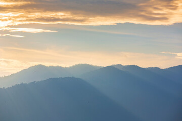 Obraz premium Dramatic sunset over the mountains in the eastern part of Thailand