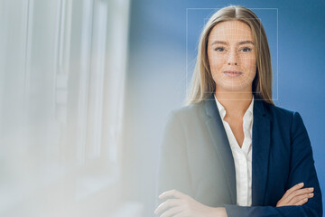 Facial recognition, businesswoman with grid over her face