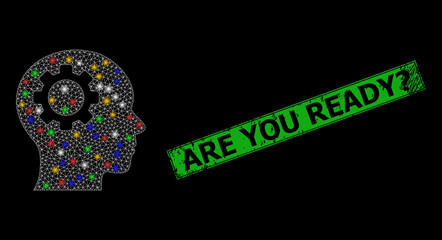 Glowing mesh net brain gear with multi colored light spots, and grunge Are You Ready? seal. Green stamp seal has Are You Ready? tag inside framed rectangle.