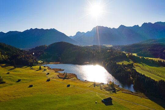 Germany, Bavaria, Krun, Scenic view of sun shining over Geroldsee lake