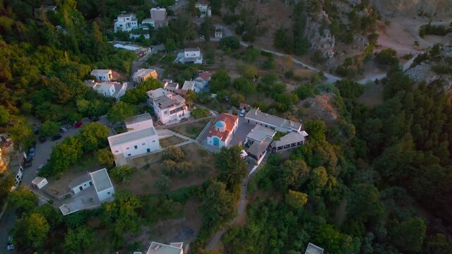 Pull back aerial reveal of Zia mountain village, Kos, Greece