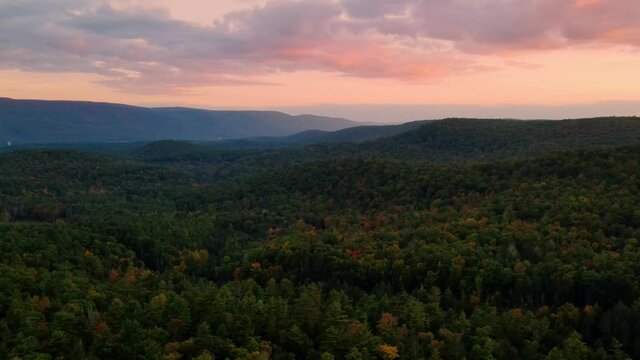 Aerial drone video footage of sunset in the beautiful Appalachian Mountains during early autumn, October. This is in the catskill mountain sub-range in New York's Hudson Valley
