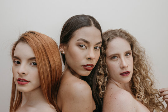 Beautiful multi ethnic women in red lipstick