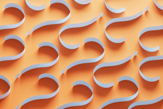 Three dimensional pattern of white question marks against orange background