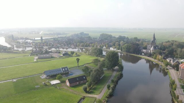 Aerial view of Amstelveen Oudekerk ad Amstel typical dutch landscape and historic village along the Amstel river in The Netherlands.