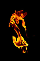 Real flames from underground gas isolated on black