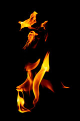 Real flames from underground gas isolated on black