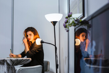 Portrait of young woman working at fair