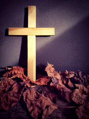 Religion Concept - wooden cross shaped in vintage background.Stock photo.