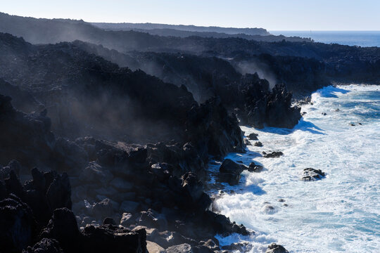 Spain, Canary Islands, Lanzarote, Tinajo, Los Volcanos nature park, sea foam at rocky coast