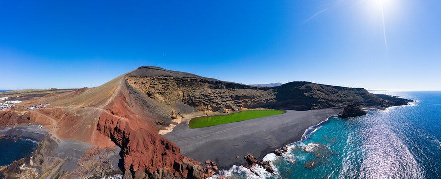 Spain, Canary Islands, Lanzarote, Aerial view of El Golfo, Charco de los Clicos, Montana del Golfo, Lago Verde