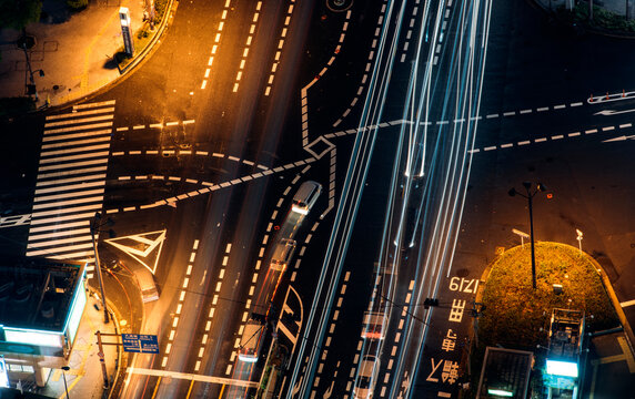 Japan, Osaka Prefecture, Osaka, Aerial view of traffic on city intersection at night