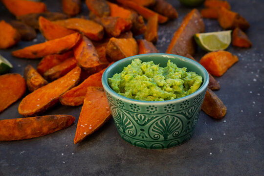 Sweet potato wedges with avocado dip and fleur de sel
