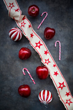 Christmas apples, candy canes and decoration, from above