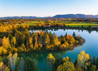 Germany, Bavaria, Upper Bavaria, Toelzer Land, Konigsdorf, Aerial view of Baggersee and forests in Autumn