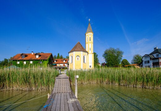 Exterior of St. Alban church at Diessen am Ammersee against blue sky, Bavaria, Germany