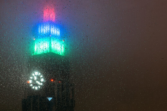 Japan, Tokyo, Yoyogi Building illuminated at rainy night