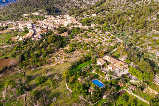 Spain, Balearic Islands, Caimari, Aerial view of finca and rural village in Serra de Tramuntana range during spring