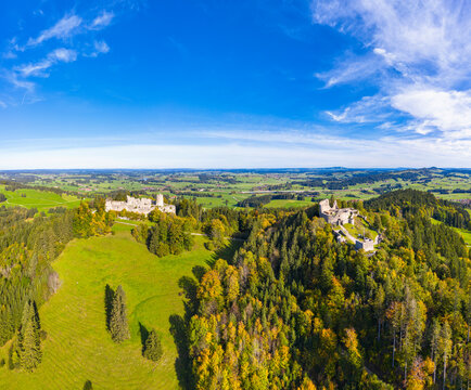 Germany, Bavaria, Eisenberg, Aerial view of ruins of Hohenfreyberg and Eisenberg castles standing on top of forested hill